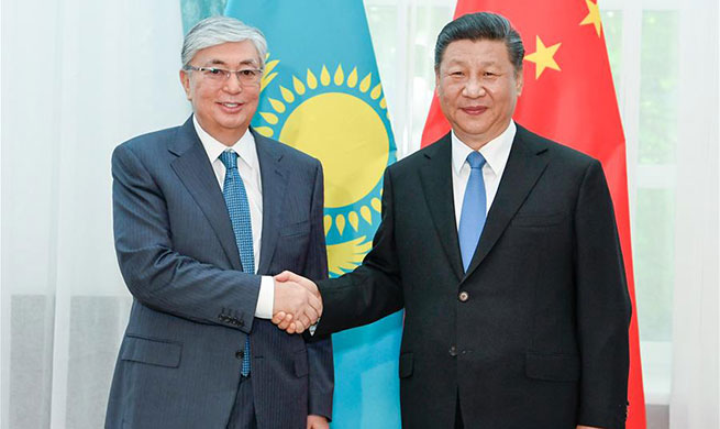 Chinese, Kazakh presidents pledge to enhance cooperation