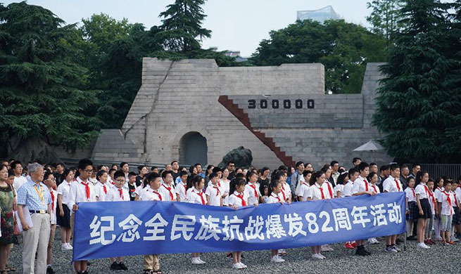 People commemorate anniv. of beginning of nationwide war against Japanese aggression in Nanjing