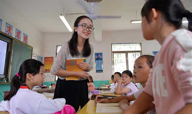 Pic story of teacher who devotes herself to rural education in China's Jiangxi