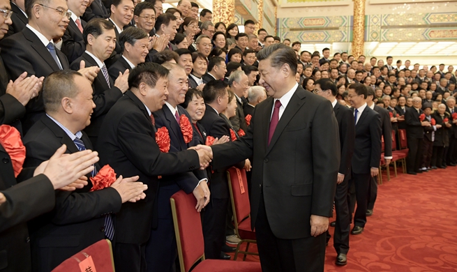 Xi meets model retired officials