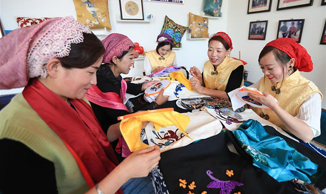 Embroidery workshop helps locals increase income in Gansu