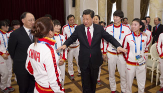 Xi boosts Chinese athletes' morale in Sochi