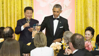 Xi attends State Dinner hosted by Obama at White House