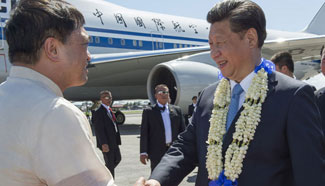 President Xi arrives in Manila for APEC meeting