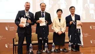 Group photo of honorable speakers in 2015 SMU China Forum