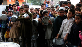 Children receive food during holy month of Ramadan in Afghanistan