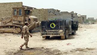 Iraqi army soldiers seen in Shuhada district