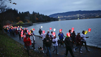 People attend "Light the Night" charity walk in Vancouver
