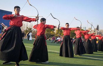 University students perform traditional ritual of archery in Anhui