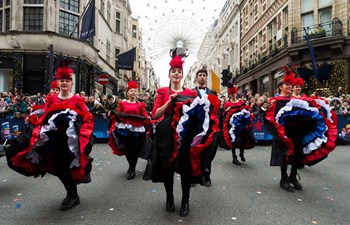 Performers parade during annual New Year's Day Parade in London