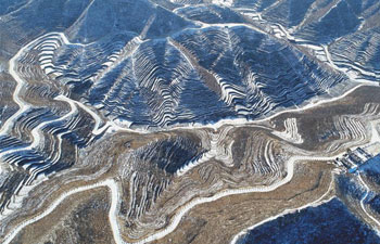 Snow scenery of terraced fields in north China's Hebei