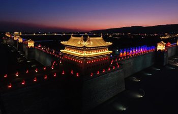 Aerial photo shows night view of ancient county seat of Taiyuan, in N China