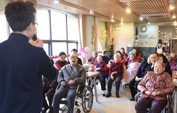 Activities held for aged people to celebrate Spring Festival in Beijing