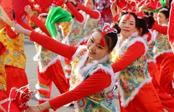 Dancers perform folk art to celebrate Chinese Lunar New Year