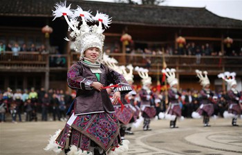 Miao people dance to celebrate coming of spring in SW China's Guizhou