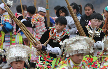 Miao people participate in "Tiaoyue" in SW China