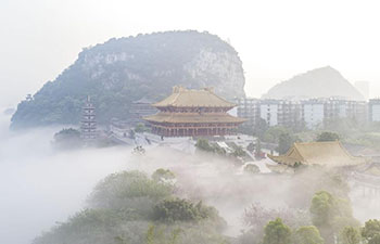 Scenery of advection fog above Liujiang River in Liuzhou, S China
