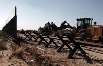 In pics: construction of new border wall between Mexico, U.S.