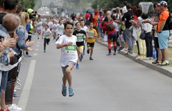 Boys compete in half-Marathon kids race in Bucharest, Romania