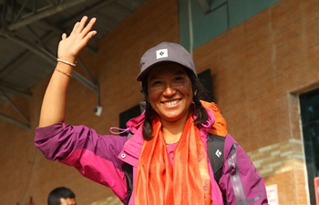 Nepali Photojournalist scales Mount Qomolangma