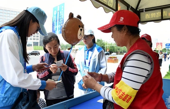 Volunteers offer services for upcoming SCO summit in Qingdao
