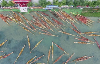 People participate in dragon boat races across China