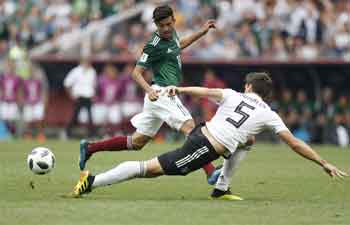 Mexico stun defending champions Germany after Lozano strike