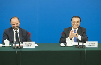 Chinese premier, French PM attend entrepreneurs symposium