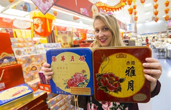 Customers buy mooncakes before Mid-Autumn Festival in Toronto
