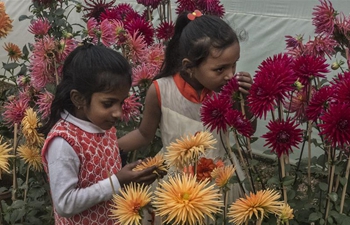 Children visit flower show in Kolkata, India