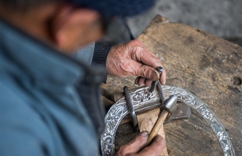 In pics: silver artisans in central China's Hunan