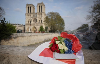Flowers presented to cathedral of Notre Dame de Paris after huge fire