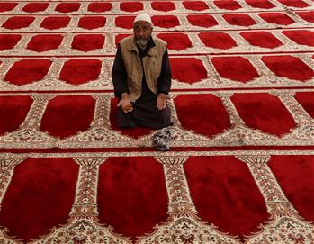 Afghan man prays during Ramadan in Kabul