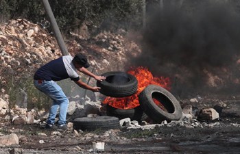 Palestinian protesters clash with Israeli soldiers near West Bank city of Nablus