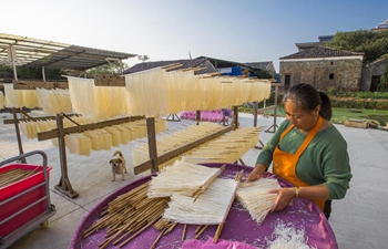 Villagers dry noodles in east China's Jiangxi
