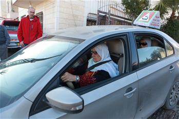 Palestinian elderly woman learns to drive in West Bank City of Hebron