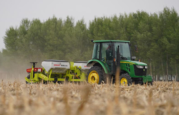 No-till planter used to seed corns in fields in NE China