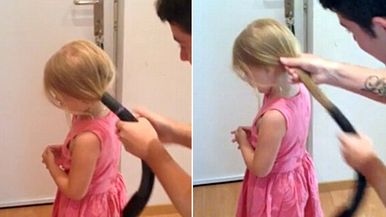 奧“天才”父親用真空吸塵器為女兒梳頭
