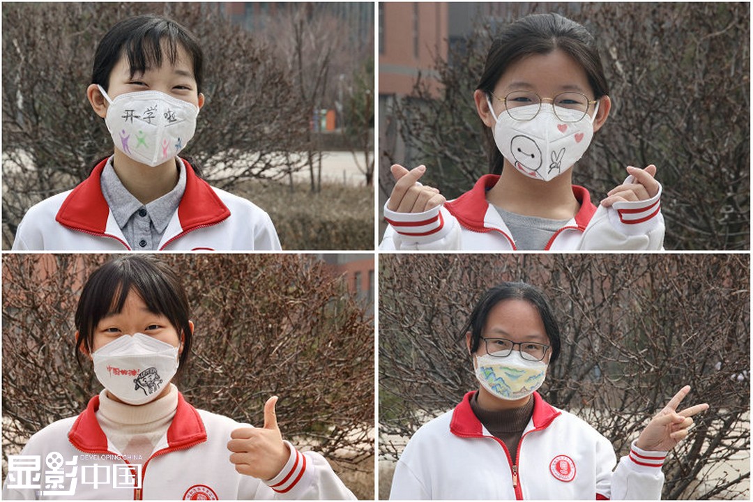 3月30日,呼和浩特市第二中学高三学生在口罩上手绘图画,为高考加油.