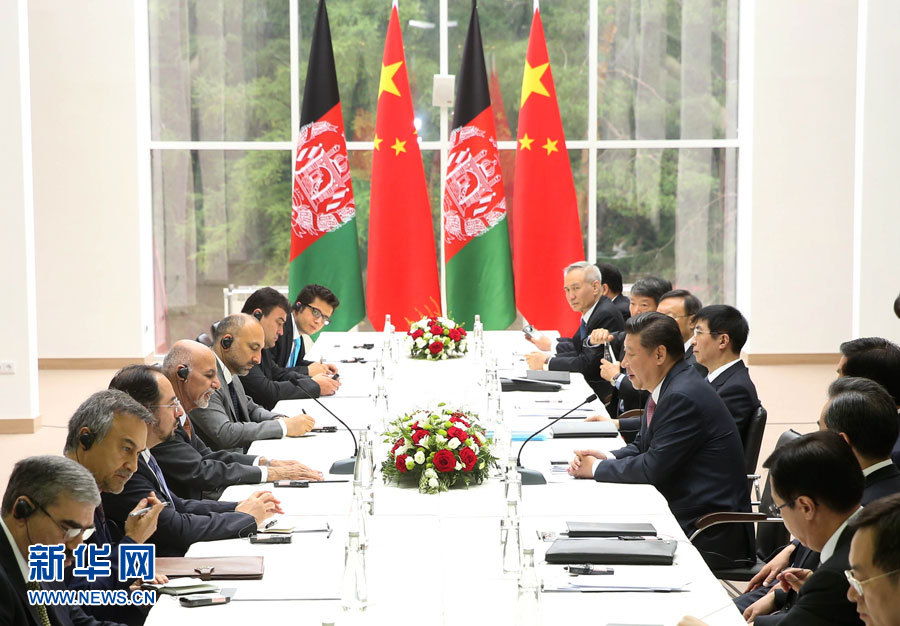 7月10日，国家主席习近平在俄罗斯乌法会见阿富汗总统加尼。新华社记者 庞兴雷 摄