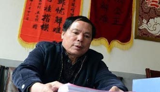 记“乡村判官”杨斌圣